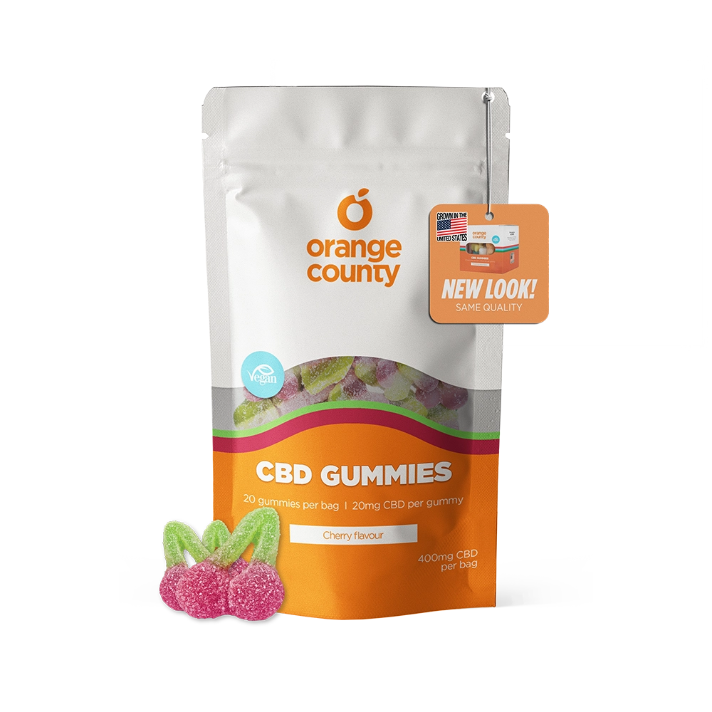 Orange County CBD Gummies in a white and orange stand-up pouch with three cherry-shaped gummies displayed in front on a white background.