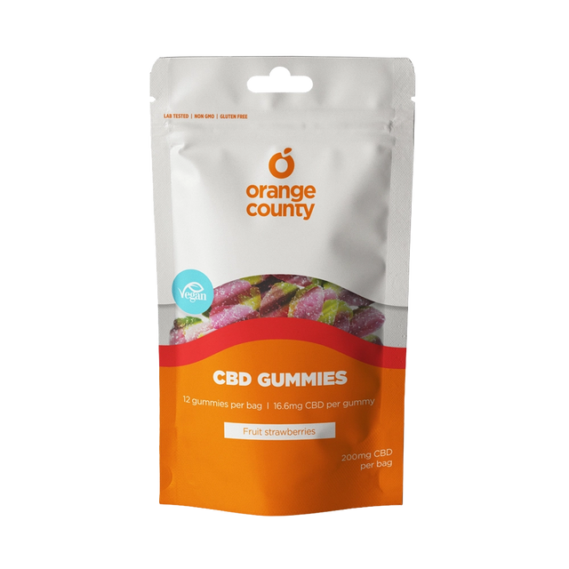 An orange and white stand-up pouch of Orange County CBD Gummies, Fruit Strawberries flavor, on a solid white background.