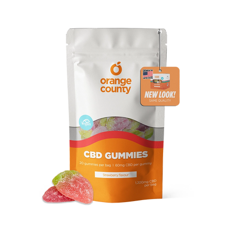 A stand-up pouch of Orange County CBD Gummies in strawberry flavor, shown on a clean white background with three gummy candies placed in front. The packaging is white and orange with a clear window revealing multicolored gummies inside, and an orange hang tag reading 'NEW LOOK! SAME QUALITY.