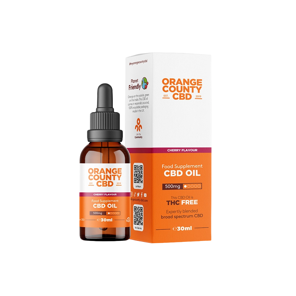 An amber glass dropper bottle of Orange County CBD Food Supplement CBD Oil next to its white and orange packaging box, on a plain white background.