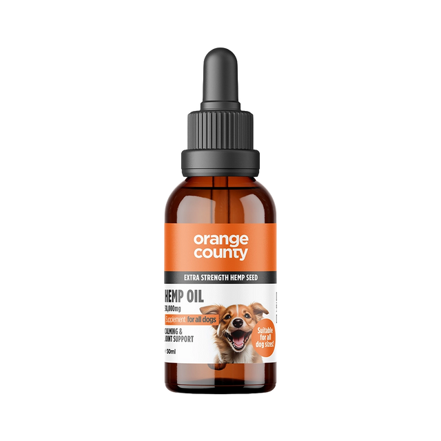 An amber glass dropper bottle of Orange County Hemp Oil for dogs, featuring a black dropper cap and a label with orange and white sections and a dog illustration, set against a plain white background.
