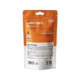 The back of a stand-up pouch of Natural Calming Treats for dogs by Orange County, featuring an orange and white design with product information shown.